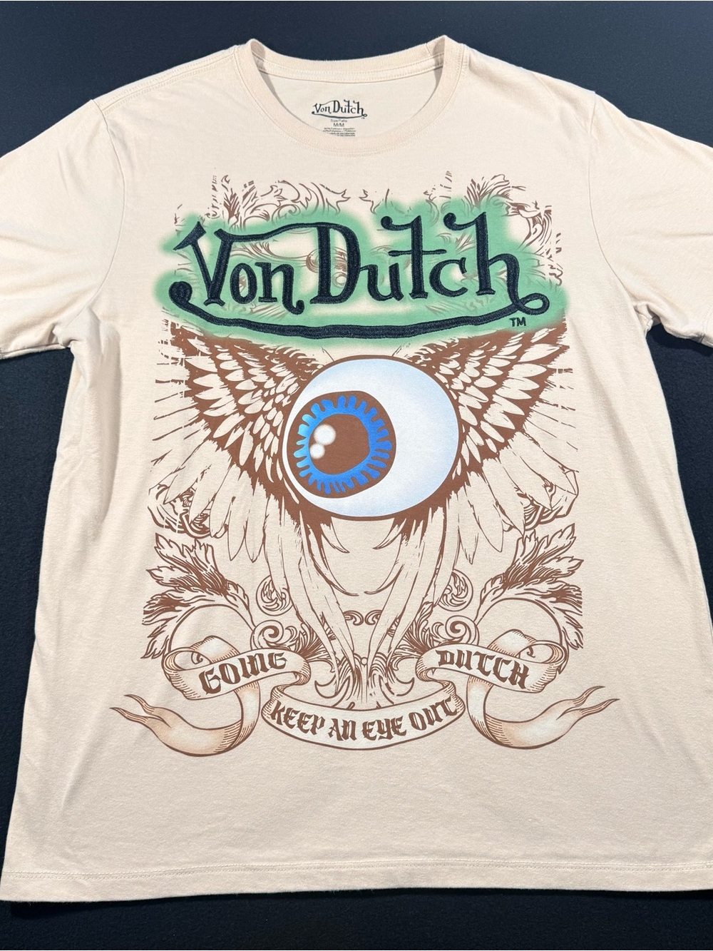 Von Dutch Cream Tee with Blue Eyeball and Brown Wing Graphic Medium